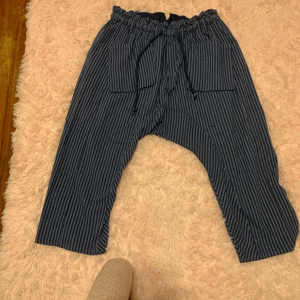 Free people drop crotch pin stripped pants
Size small with lots of stretch
